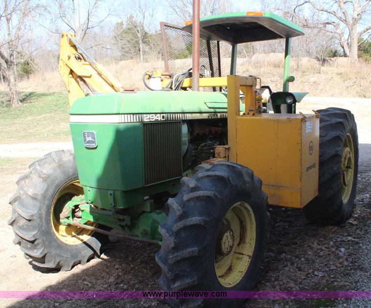 image for item H6218 1980 John Deere 2940 MFWD tractor with boom mower