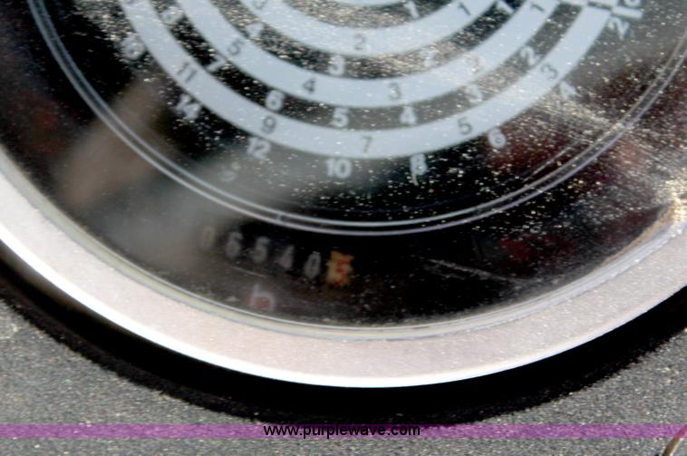 image for item H6218 1980 John Deere 2940 MFWD tractor with boom mower