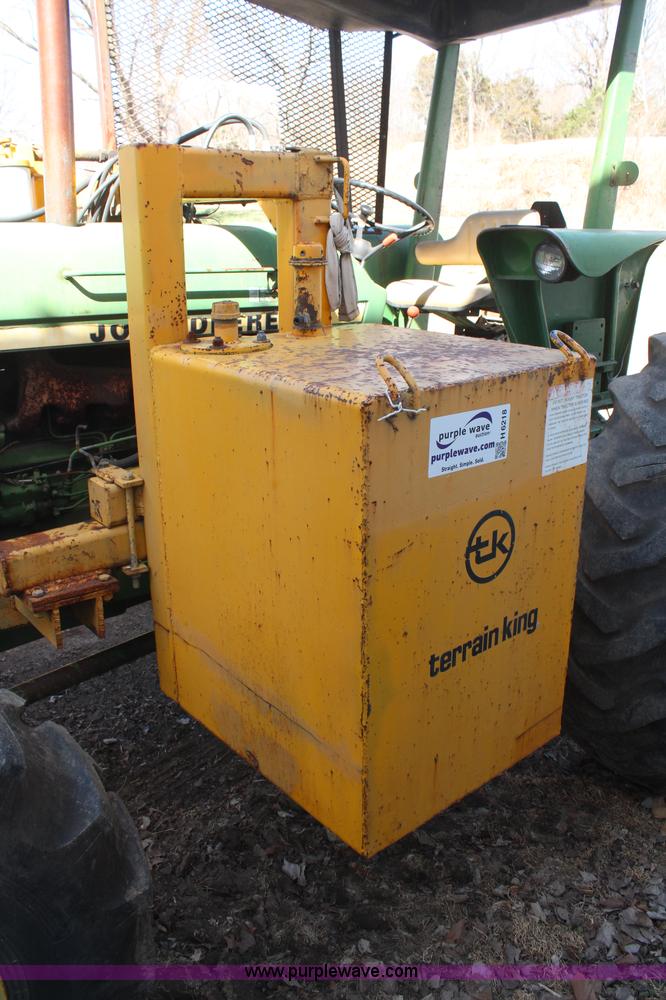 image for item H6218 1980 John Deere 2940 MFWD tractor with boom mower