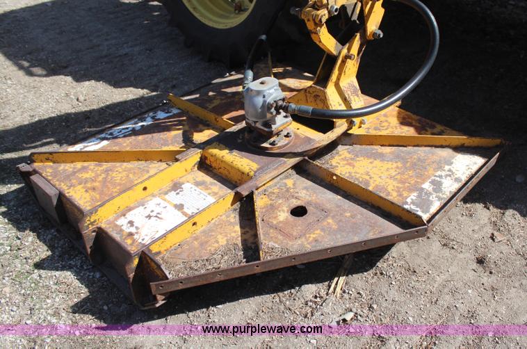 image for item H6218 1980 John Deere 2940 MFWD tractor with boom mower