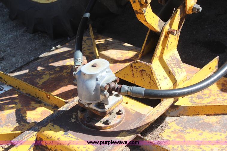 image for item H6218 1980 John Deere 2940 MFWD tractor with boom mower