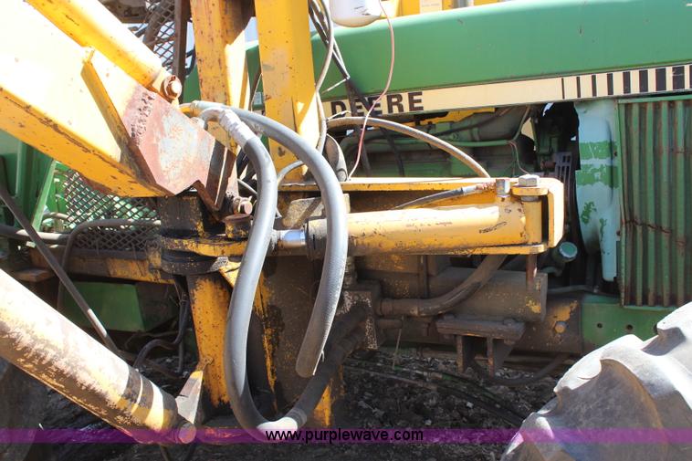 image for item H6218 1980 John Deere 2940 MFWD tractor with boom mower
