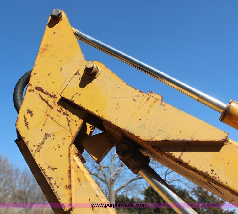 image for item H6218 1980 John Deere 2940 MFWD tractor with boom mower