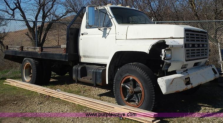 image for item I3688 1980 Ford F350 flatbed pickup truck
