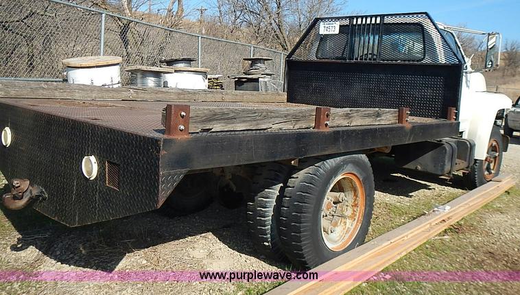 image for item I3688 1980 Ford F350 flatbed pickup truck