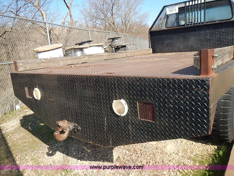 image for item I3688 1980 Ford F350 flatbed pickup truck