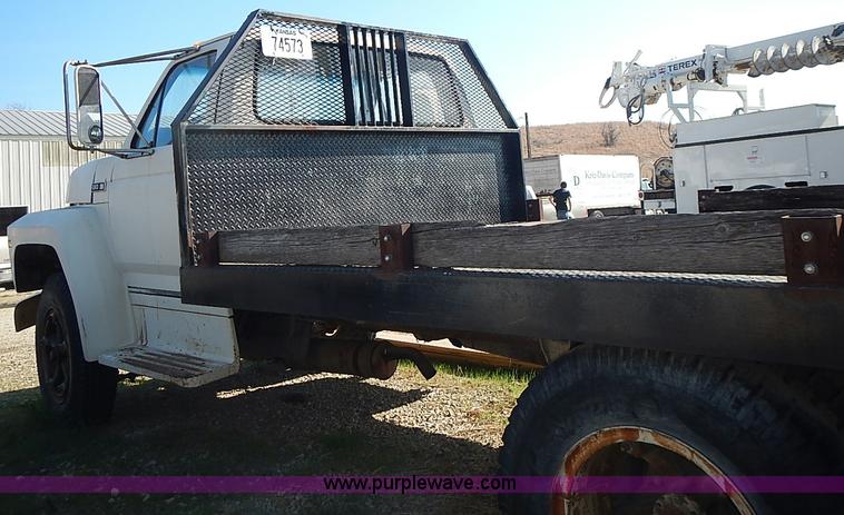 image for item I3688 1980 Ford F350 flatbed pickup truck
