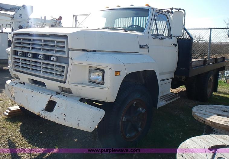 image for item I3688 1980 Ford F350 flatbed pickup truck