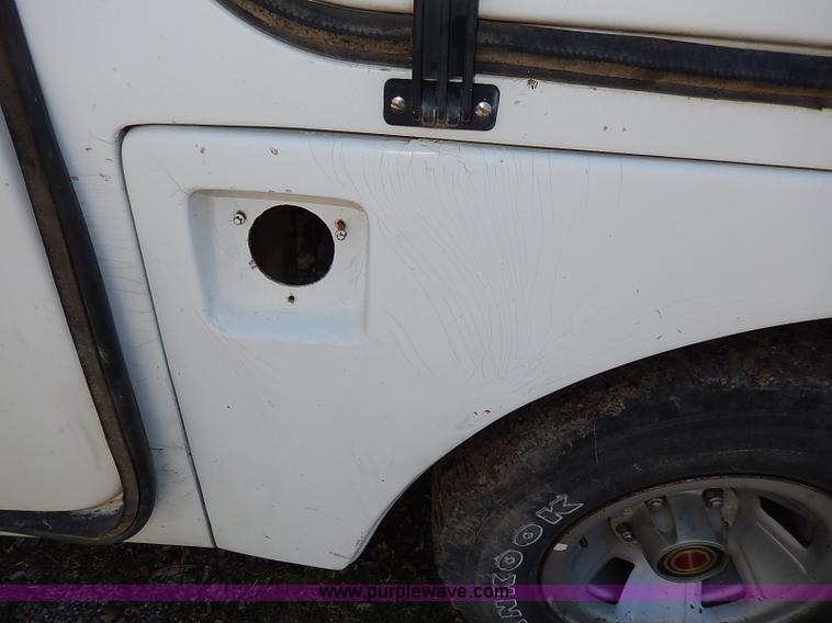 image for item I3705 1994 Ford F150 XL utility truck