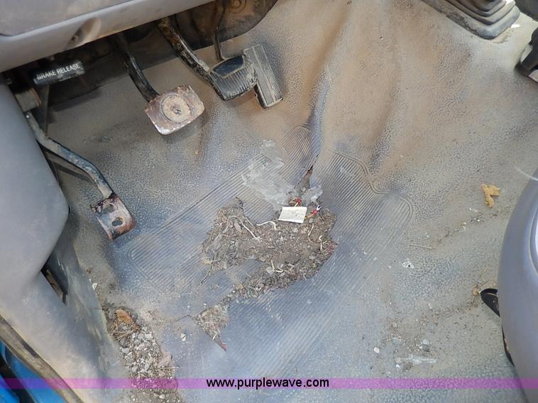 image for item I3705 1994 Ford F150 XL utility truck