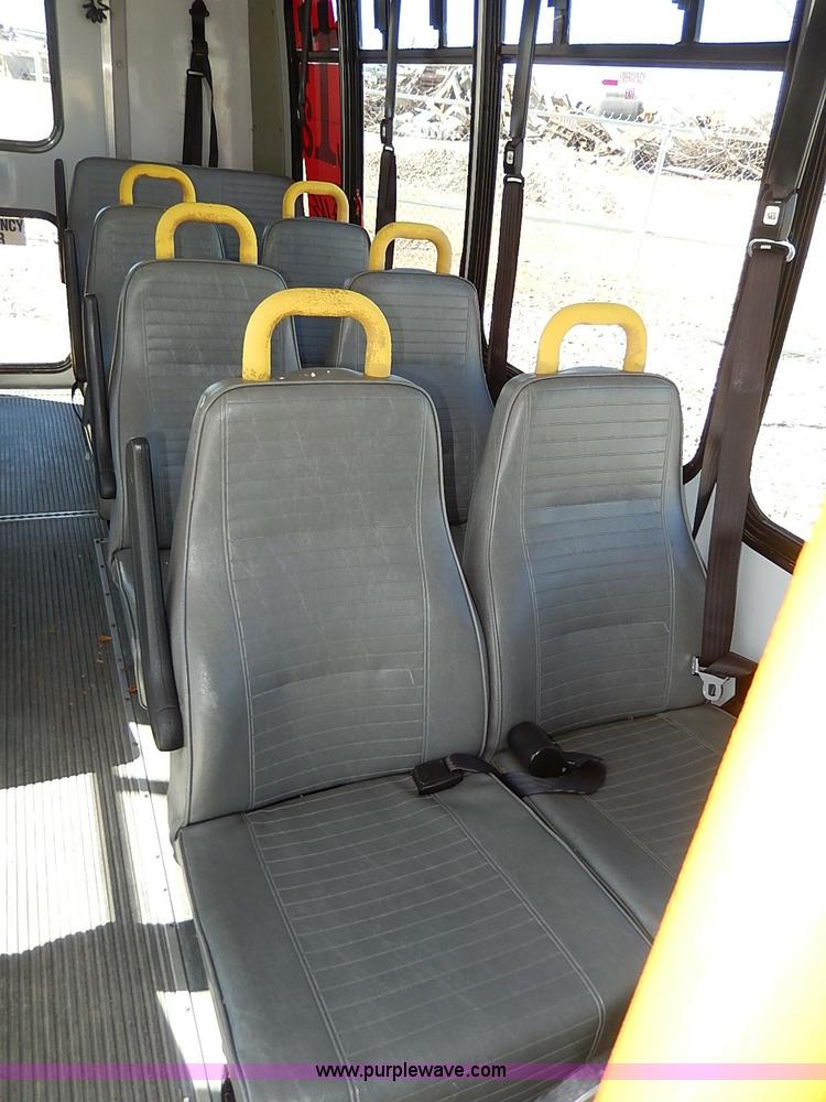 image for item I3746 2004 Ford E350 Super Duty bus