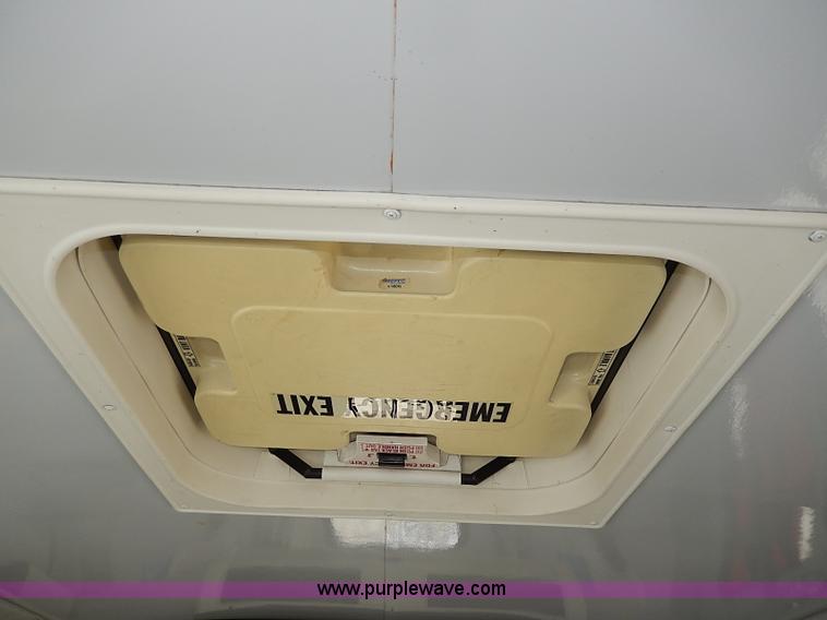 image for item I3746 2004 Ford E350 Super Duty bus