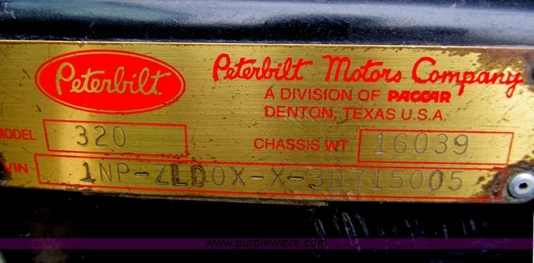 image for item I7107 2003 Peterbilt 320 refuse truck