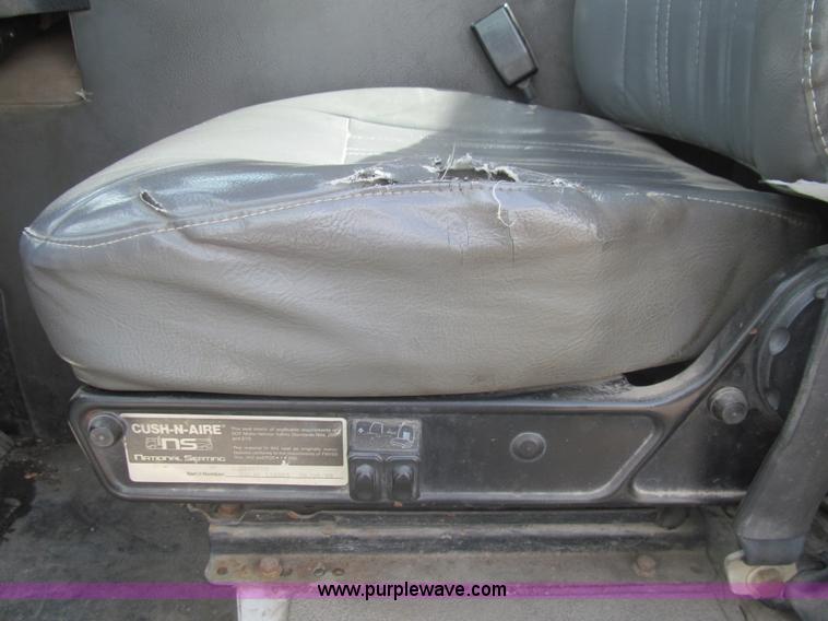 image for item I7108 2000 Volvo WXLL64 refuse truck