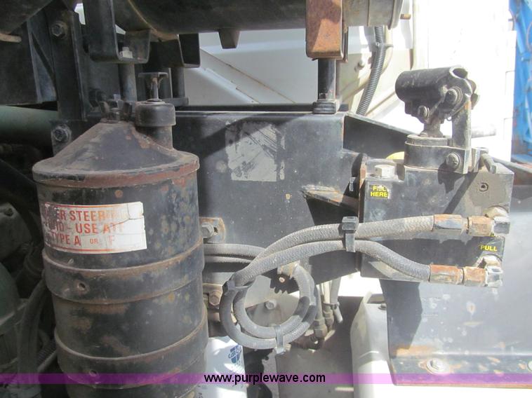 image for item I7108 2000 Volvo WXLL64 refuse truck