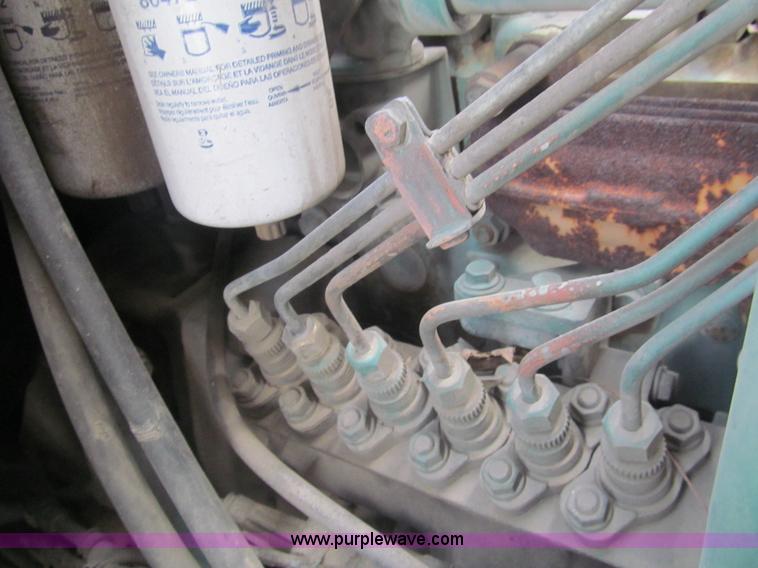 image for item I7108 2000 Volvo WXLL64 refuse truck