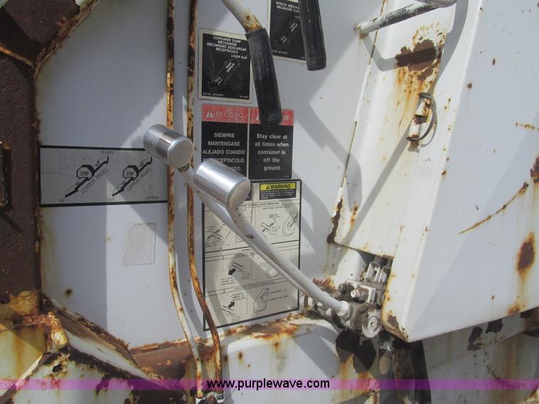 image for item I7108 2000 Volvo WXLL64 refuse truck