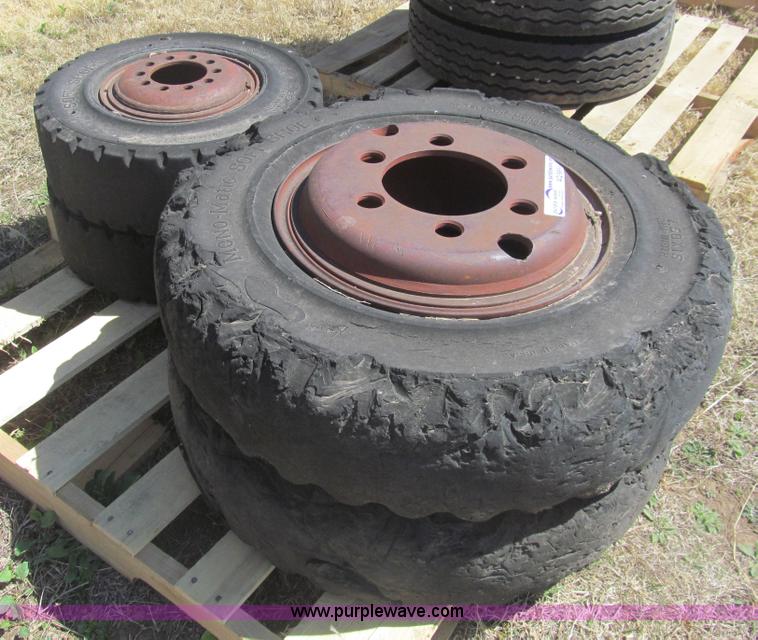 image for item AQ9854 (4) solid forklift tires