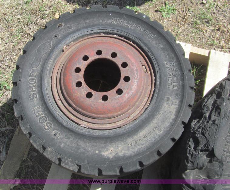 image for item AQ9854 (4) solid forklift tires