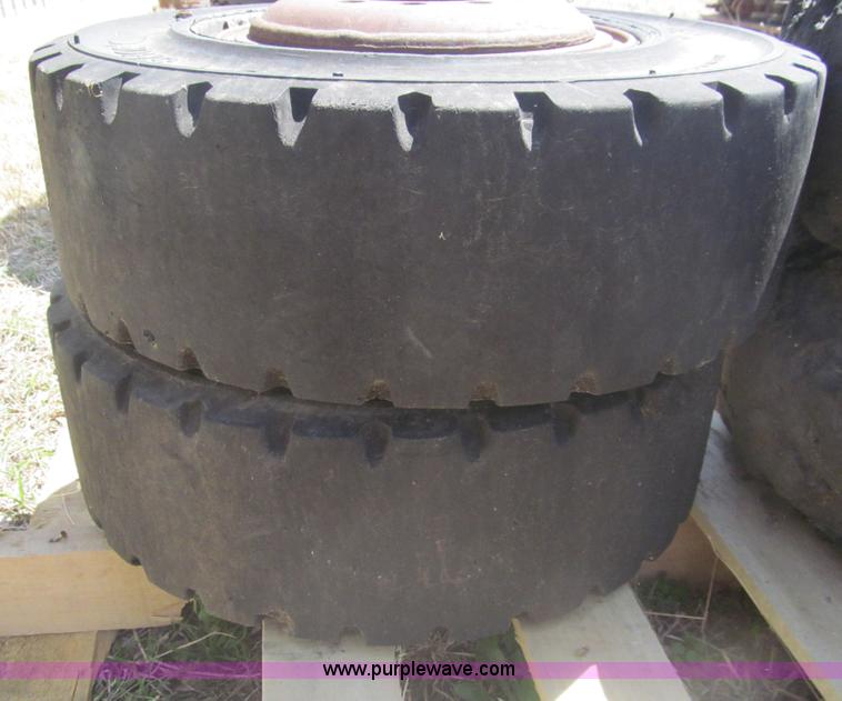 image for item AQ9854 (4) solid forklift tires