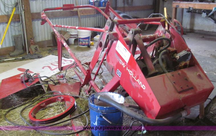 image for item G2355 New Holland 75 hydraulic bale thrower