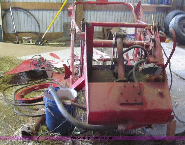 image for item G2355 New Holland 75 hydraulic bale thrower