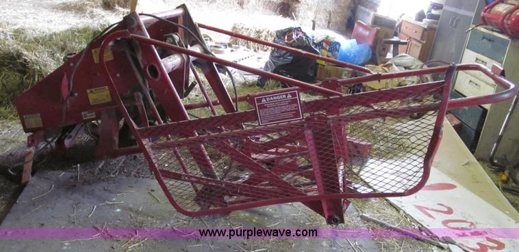 image for item G2355 New Holland 75 hydraulic bale thrower