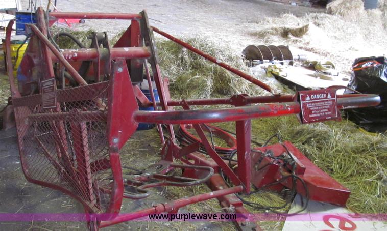 image for item G2355 New Holland 75 hydraulic bale thrower