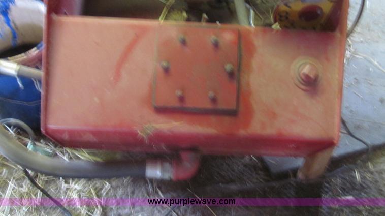 image for item G2355 New Holland 75 hydraulic bale thrower