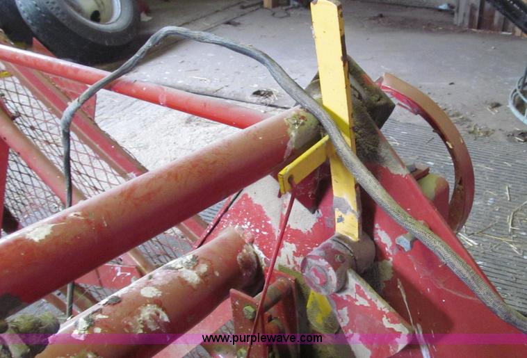 image for item G2355 New Holland 75 hydraulic bale thrower