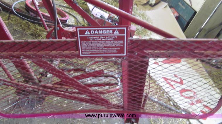 image for item G2355 New Holland 75 hydraulic bale thrower