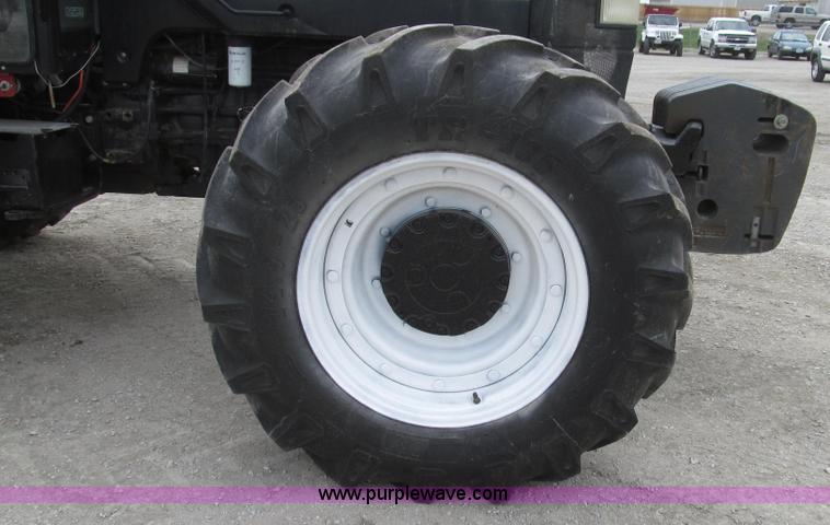 image for item G2356 2003 New Holland TM155 MFWD tractor