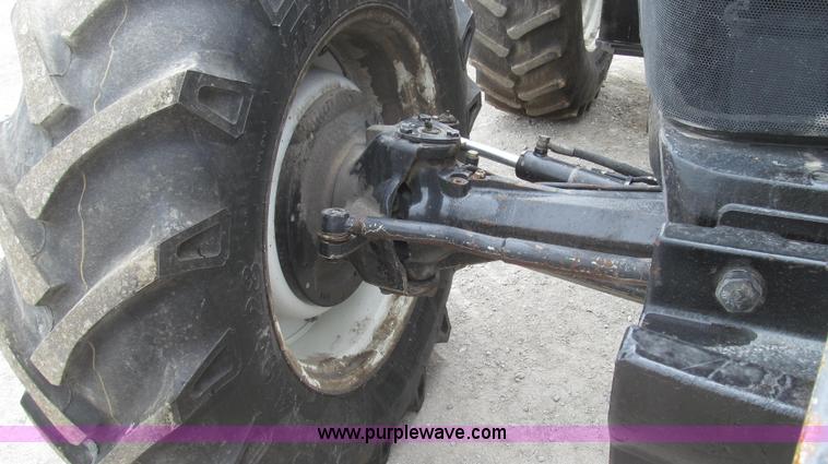 image for item G2356 2003 New Holland TM155 MFWD tractor