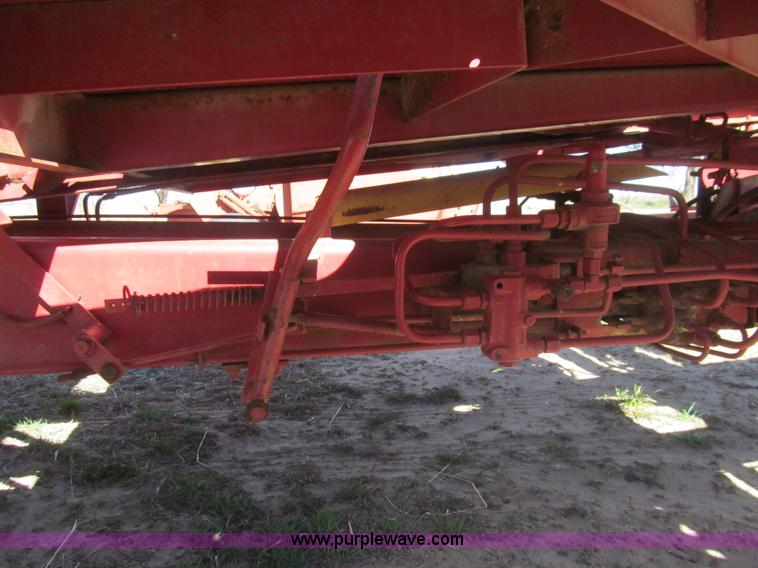 image for item G8420 New Holland Stackliner 1037 bale wagon