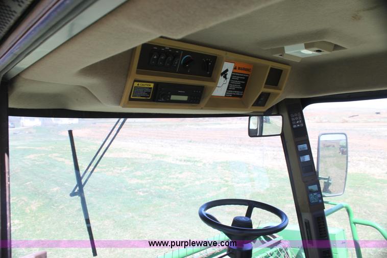 image for item H2147 2004 John Deere 4895 self-propelled swather