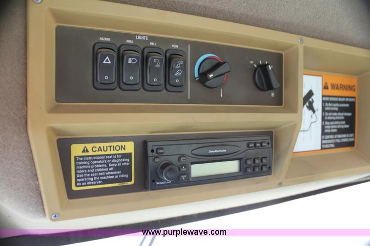 image for item H2147 2004 John Deere 4895 self-propelled swather