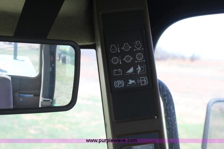 image for item H2147 2004 John Deere 4895 self-propelled swather