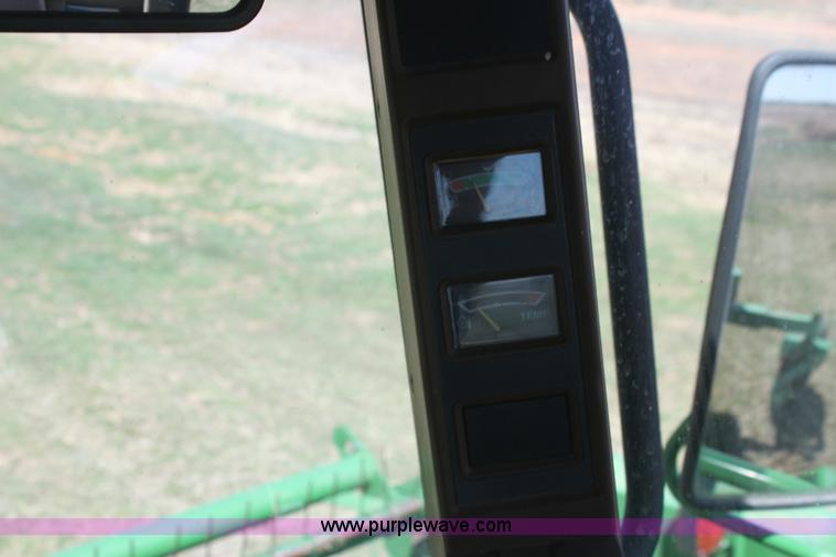 image for item H2147 2004 John Deere 4895 self-propelled swather