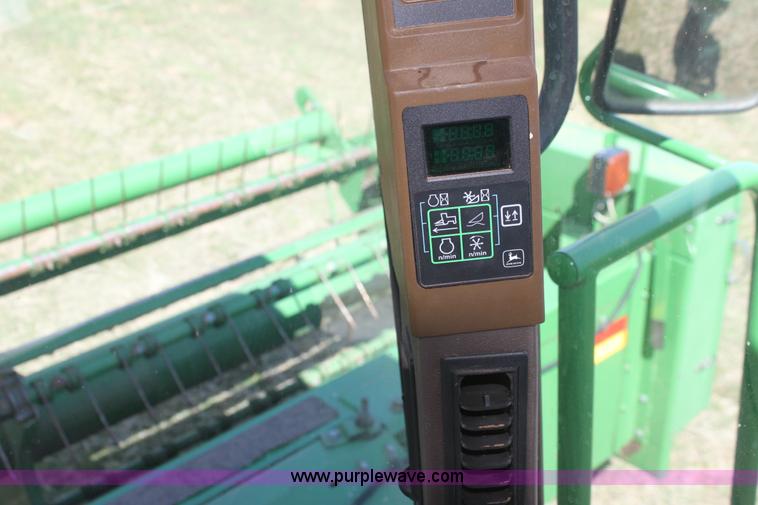 image for item H2147 2004 John Deere 4895 self-propelled swather