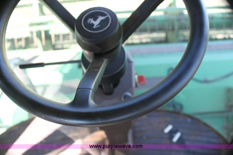 image for item H2147 2004 John Deere 4895 self-propelled swather