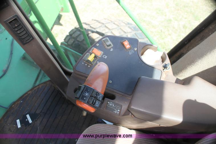 image for item H2147 2004 John Deere 4895 self-propelled swather