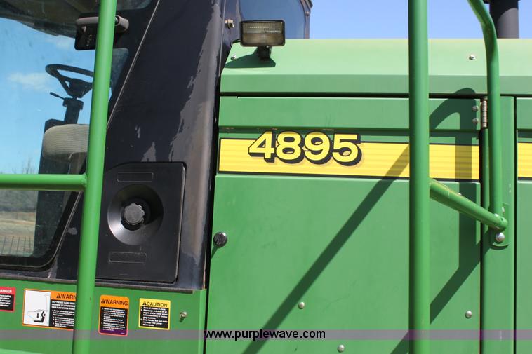 image for item H2147 2004 John Deere 4895 self-propelled swather