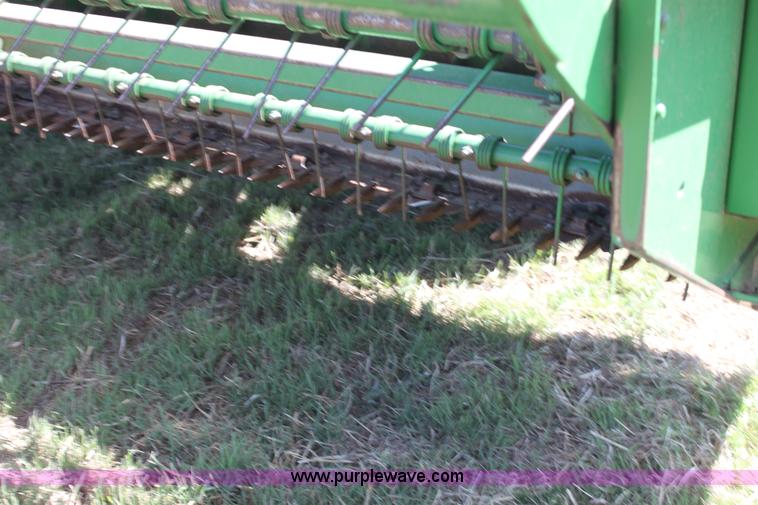 image for item H2147 2004 John Deere 4895 self-propelled swather