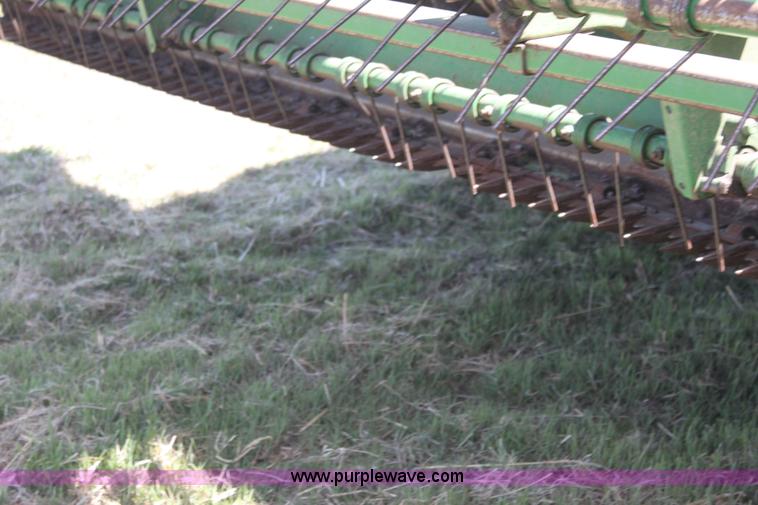 image for item H2147 2004 John Deere 4895 self-propelled swather