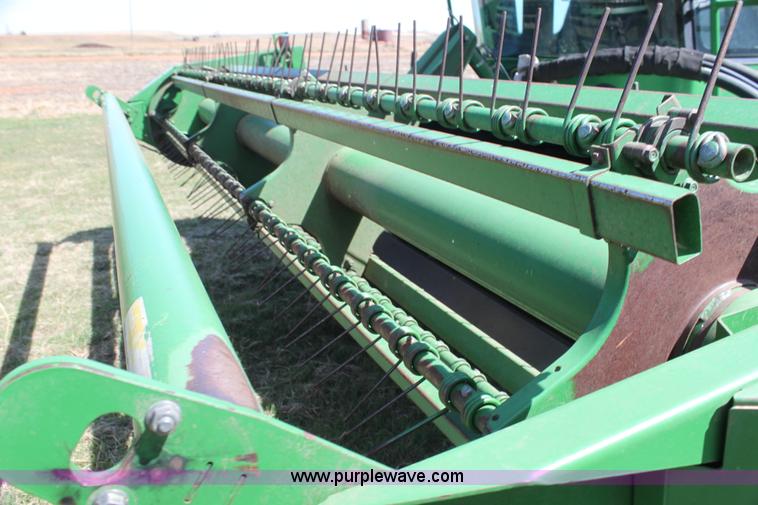 image for item H2147 2004 John Deere 4895 self-propelled swather