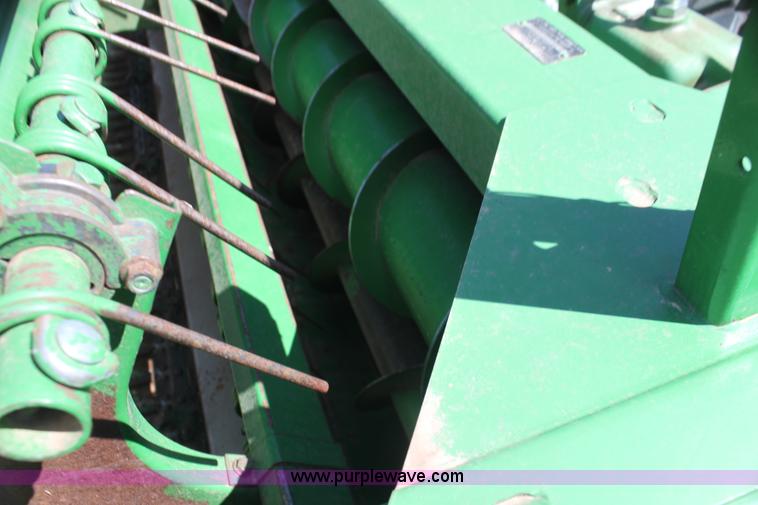 image for item H2147 2004 John Deere 4895 self-propelled swather