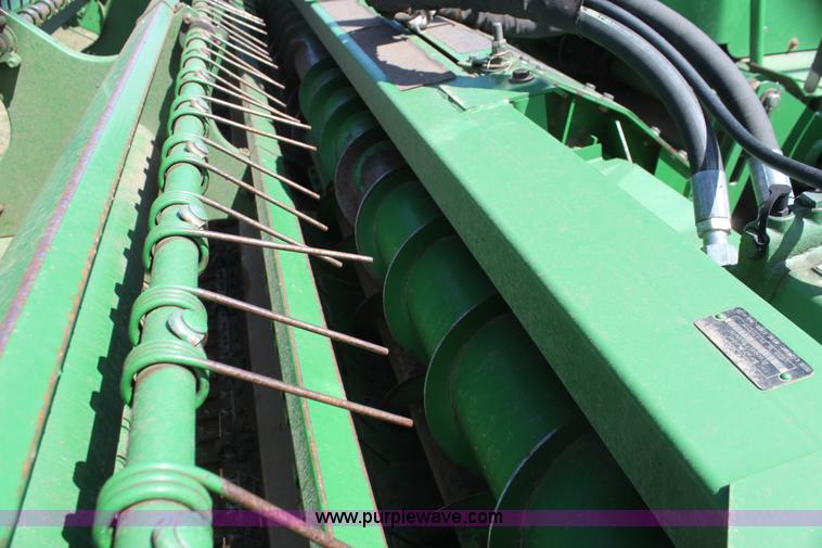 image for item H2147 2004 John Deere 4895 self-propelled swather