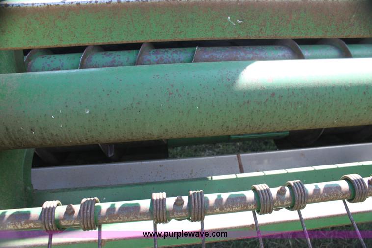 image for item H2147 2004 John Deere 4895 self-propelled swather