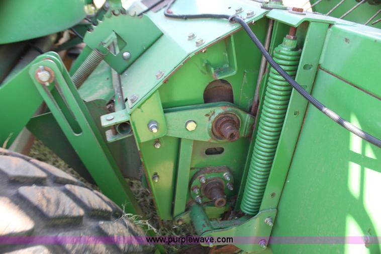 image for item H2147 2004 John Deere 4895 self-propelled swather