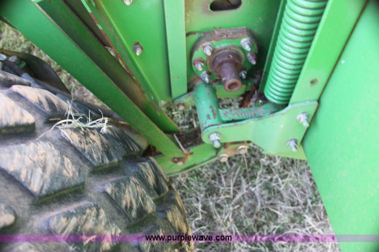 image for item H2147 2004 John Deere 4895 self-propelled swather